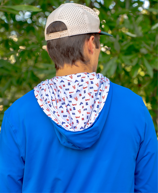Back view of blue golf hoodie with hood down, showing interior lining covered in red and blue Philly sports-inspired icons for added personality.