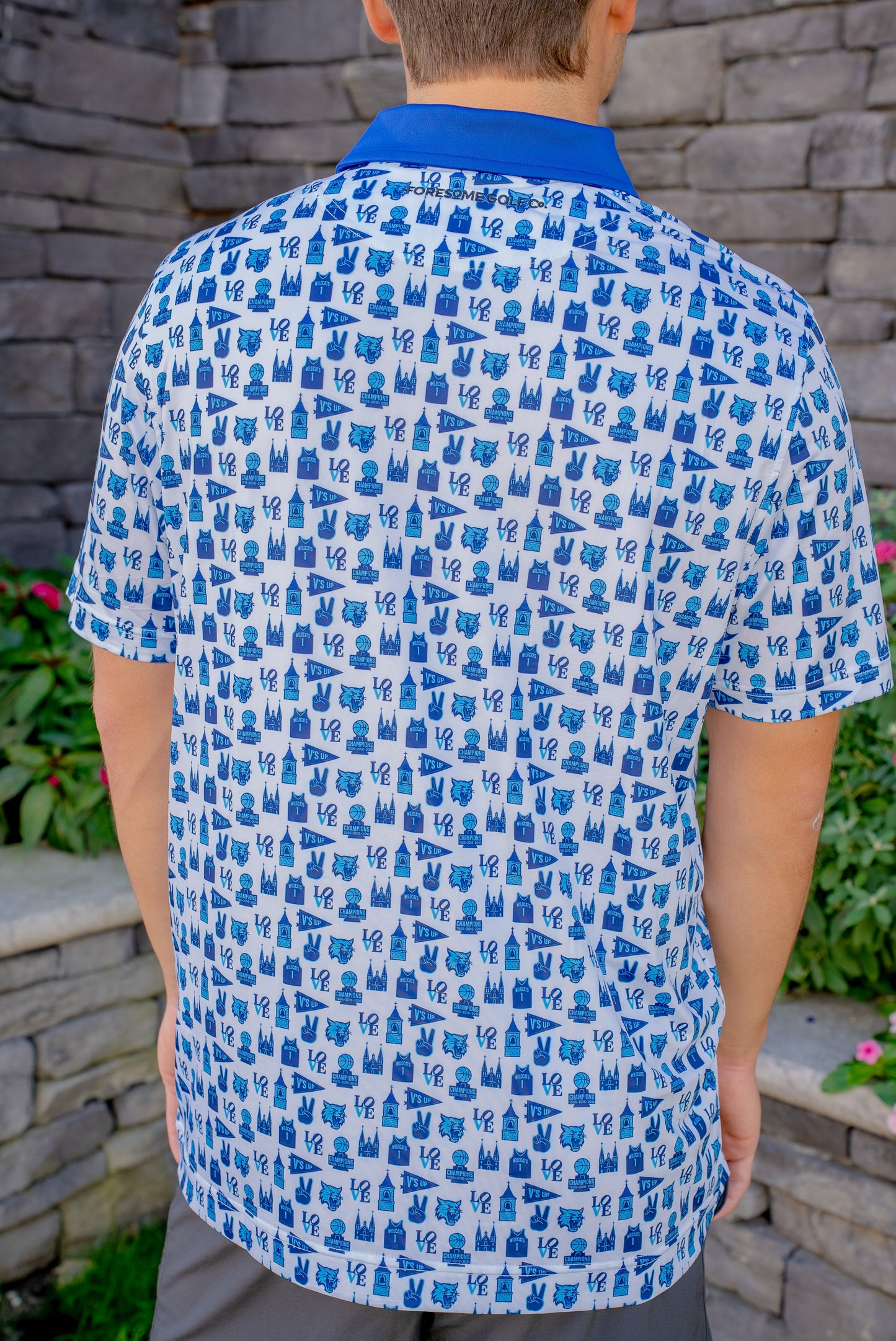 Back view of the Villanova Main Line Madness men’s basketball golf polo showing clean lines and lightweight stretch fabric for comfort on the course.